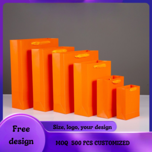 Orange color kraft gift and shopping bags