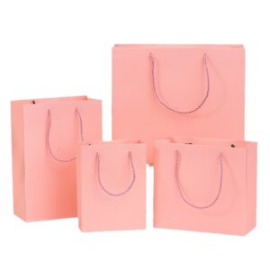 Pink color paper shopping and gift bag